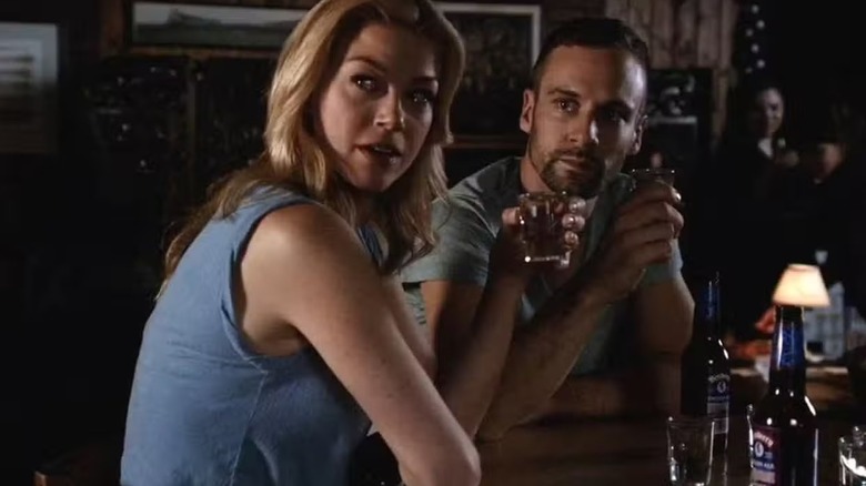 Bobbi Morse (Adrianne Palicki) and Lance Hunter (Nick Blood) sit at a bar in Marvel's Agents of S.H.I.E.L.D.