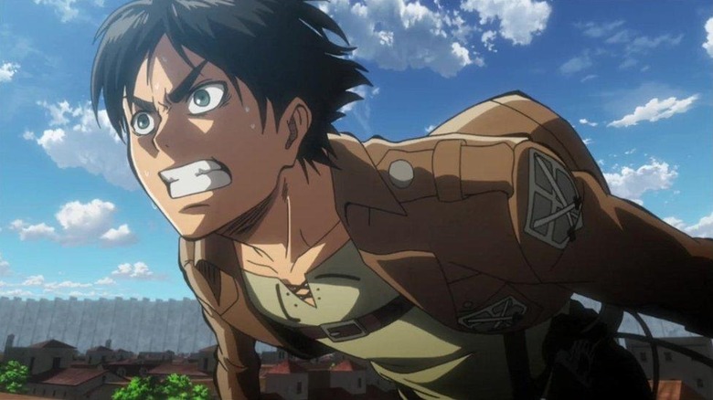 Eren Yeager lunges forward in Attack on Titan