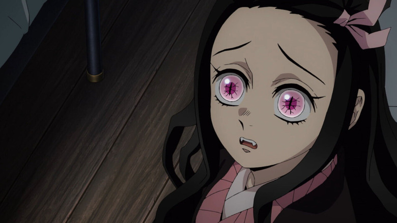 Nezuko Kamado looks up in shock in Demon Slayer: Kimetsu no Yaiba