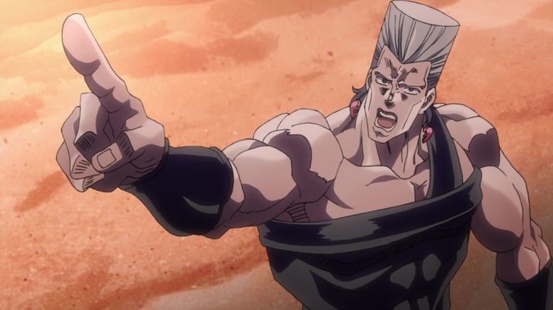 Jean-Pierre Polnareff points upward while standing in a desert in JoJo's Bizarre Adventure