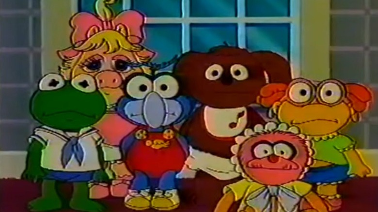 Baby Kermit, Baby Piggy, Baby Gonzo, Baby Rowlf, Baby Animal, and Baby Skeeter staring blankly on The Muppet Show S1E5
