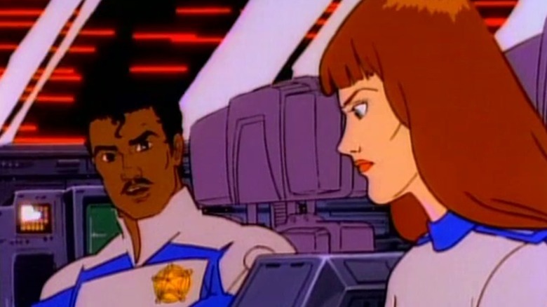 Doc and Niko sitting in a spaceship on The Adventures of the Galaxy Rangers S1E57