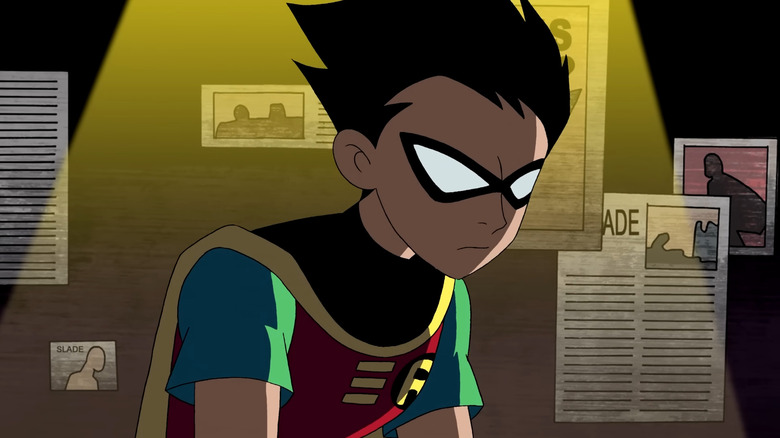 Scott Menville's Robin looking down in Teen Titans
