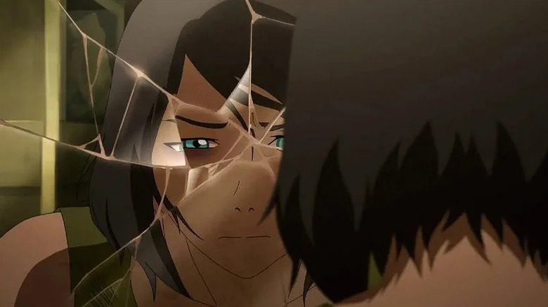 Korra (Janet Varney) looks at her reflection in a broken mirror in The Legend of Korra