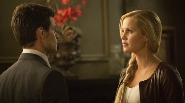 Elijah Mikaelson (Daniel Gillies) and Rebekah Mikaelson (Claire Holt) speak tensely in The Vampire Diaries