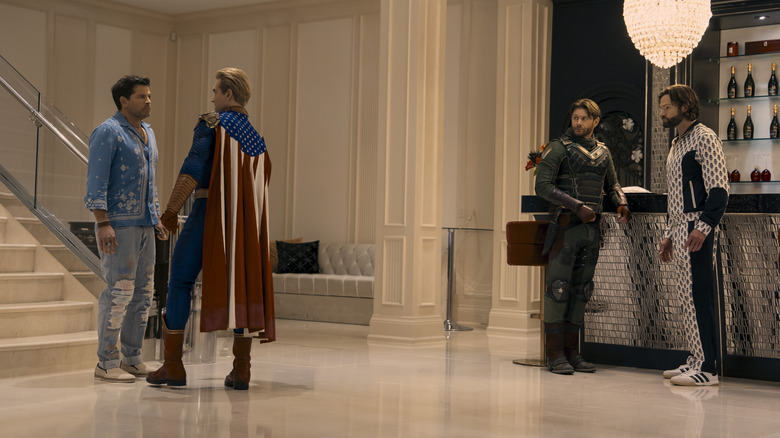 Malchemical (Misha Collins), Homelander (Antony Starr), Soldier Boy (Jensen Ackles), Mister Marathon (Jared Padalecki) talking together in The Boys