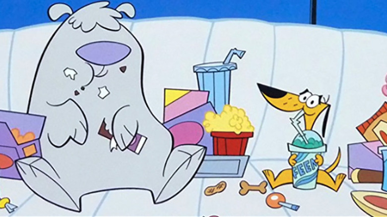 A big dog (Brad Garrett) and little dog (Mark Schiff) eat snacks in 2 Stupid Dogs