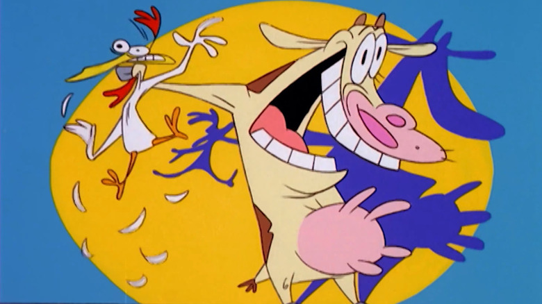 Cow (Charlie Adler) grabs Chicken (Charlie Adler) by the neck in Cow and Chicken