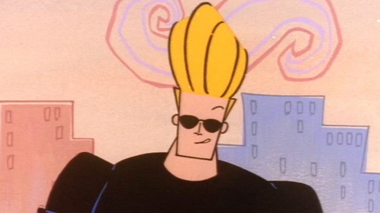 Johnny Bravo (Jeff Bennett) smiles at the camera in Johnny Bravo
