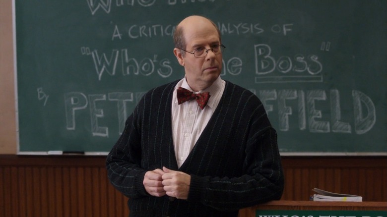 Stephen Tobolowksy as Professor Sheffield standing in front of his whiteboard in Community.