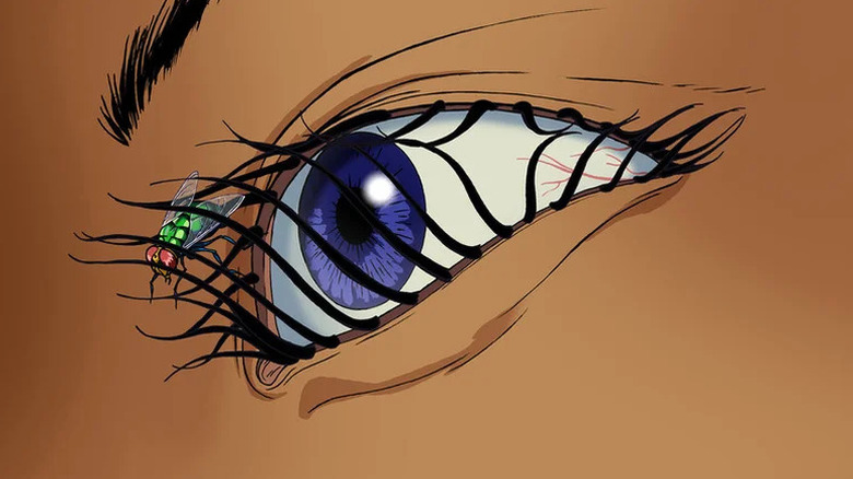 A fly crawls around a woman's eye in "Æon Flux."