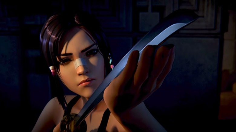 Elle examines a sword closely in "Blade Runner: Black Lotus."
