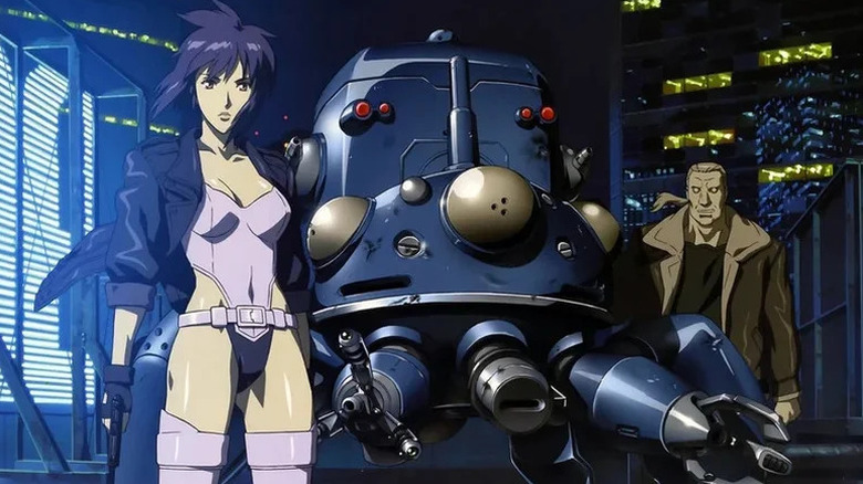 Motoko and Batou stand next to a gunship in "Ghost in the Shell: Stand Alone Complex."