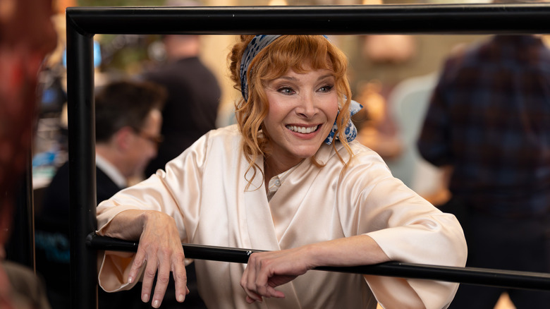 Lisa Kudrow as Valerie with red hair and robe in The Comeback