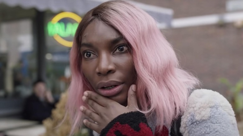 Michaela Coel as Arabella holding her chin in "I May Destroy You."