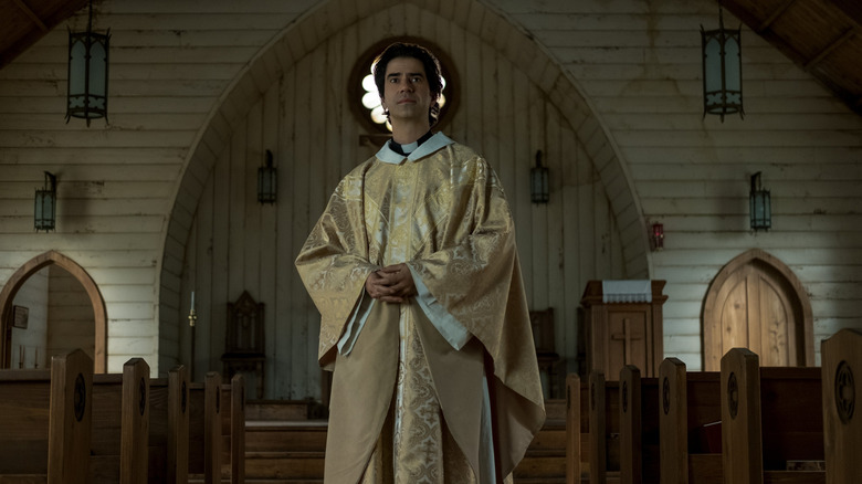 Father Paul Hill in empty church