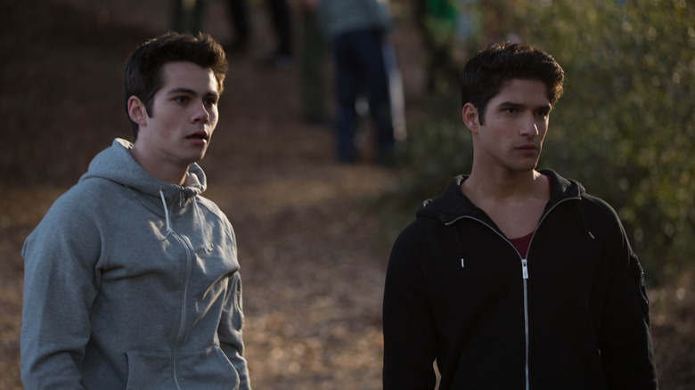 Stiles and Scott standing outside