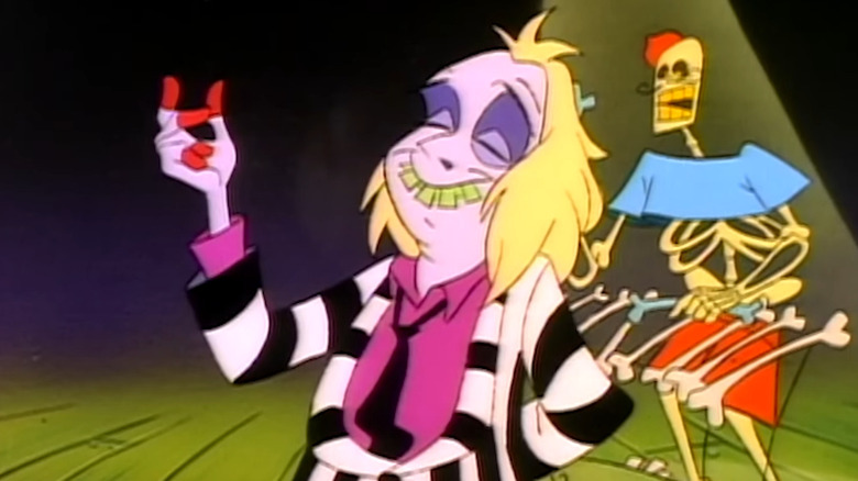 Beetlejuice snapping his fingers in front of a skeleton man in Beetlejuice
