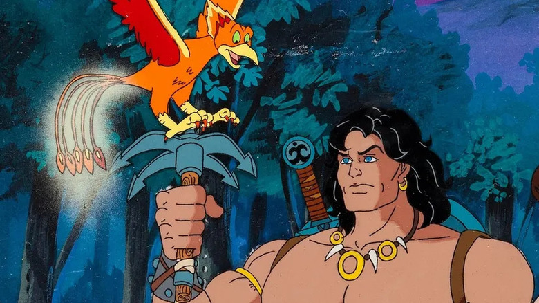 Conan holds a grappling hook in Conan The Adventurer