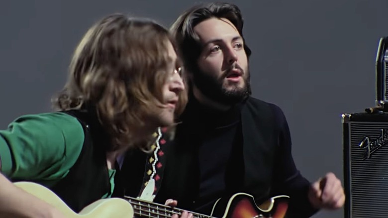 John Lennon and Paul McCartney with their instruments in Get Back