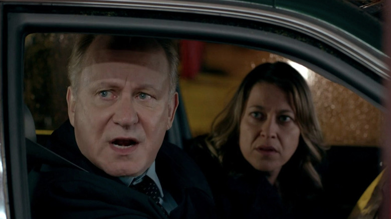 Stellan Skarsgård as John River sitting in car next to Nicola Walker as Stevie in River