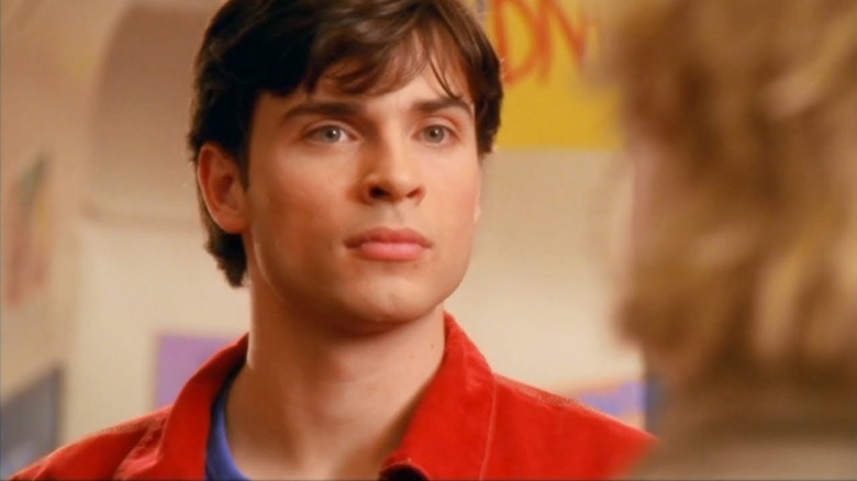 Clark Kent talking to a student