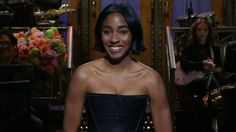 Ayo Edebiri smiling in her SNL monologue