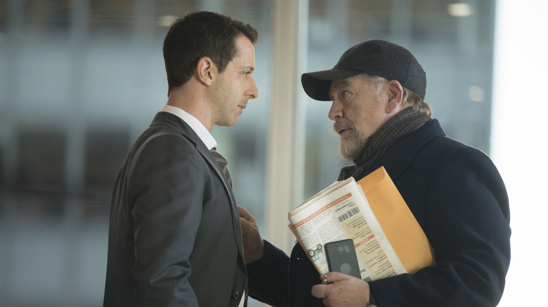 Kendall Roy (Jeremy Strong) speaks with Logan Roy (Brian Cox) in Succession