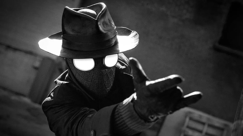 Spider-Noir aims his web shoots in Spider-Noir.