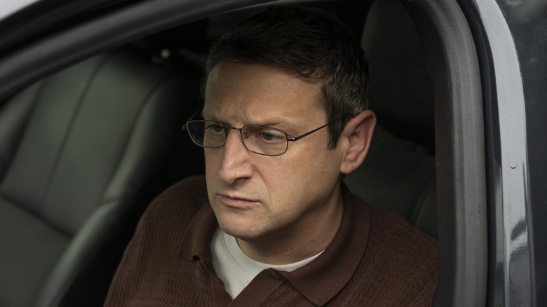 Ron (Tim Robinson) is nervous in his car in The Chair Company