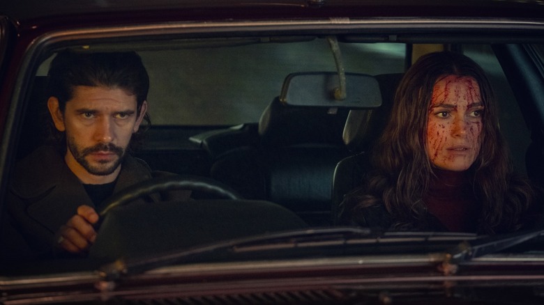 Sam Young (Ben Whishaw) and Helen Webb (Keira Knightley) sat in a car on Black Doves