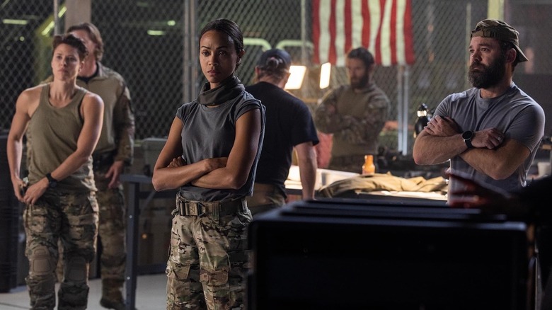 Kyle McManus (Thad Luckinbill), Joe McNamara (Zoe Saldaña), Bobby (Jill Wagner), Two Cups (James Jordan), Randy (Austin Hébert), and Tex (Jonah Wharton) looking ready for action on Lioness