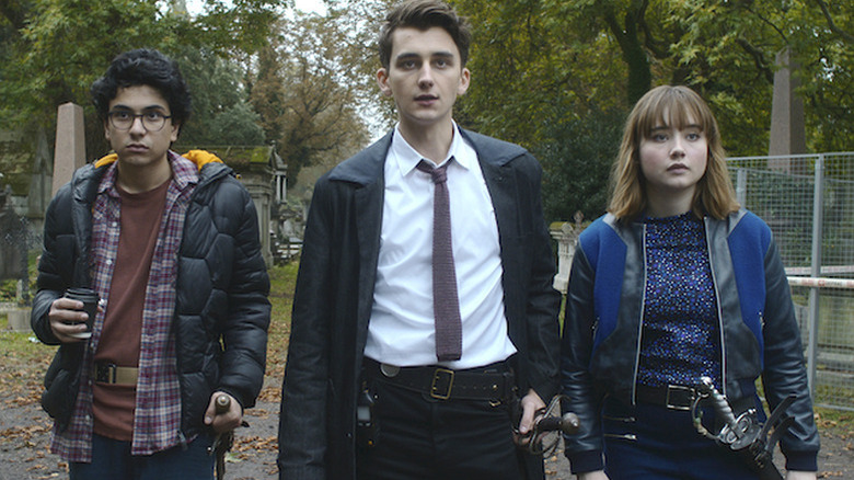 George (Ali Hadji-Heshmati), Anthony (Cameron Chapman), and Lucy (Ruby Stokes) standing next to each other on "Lockwood and Co."