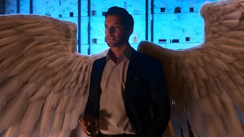 Lucifer (Tom Ellis) extending his wings.