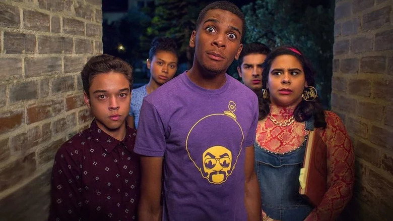 Jason Genao as Ruby, Sierra Capri as Monse, Brett Gray as Jamal, Diego Tinoco as Cesar, and Jessica Marie Garcia standing in doorway in On My Block