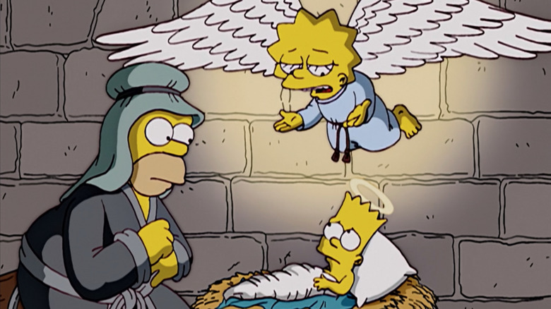 Angel Lisa speaks with Jesus Bart and Joseph Homer in "The Simpsons."