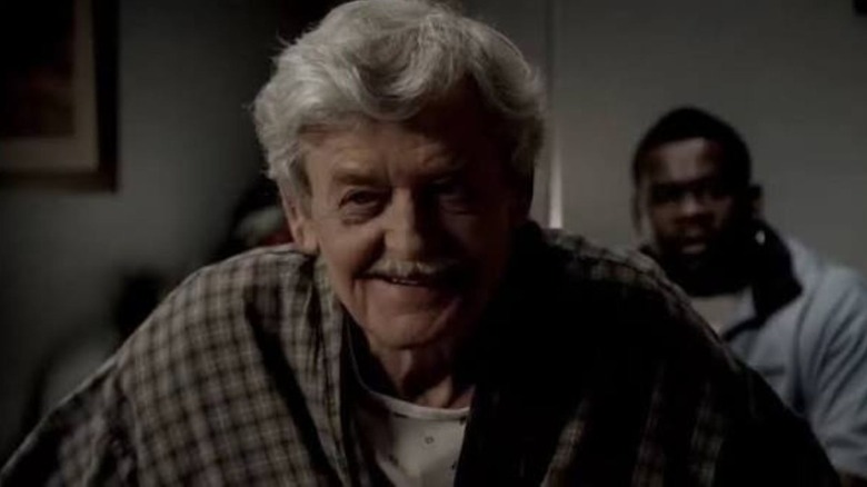 Hal Holbrook as John Schwinn, smiling in a robe in The Sopranos.