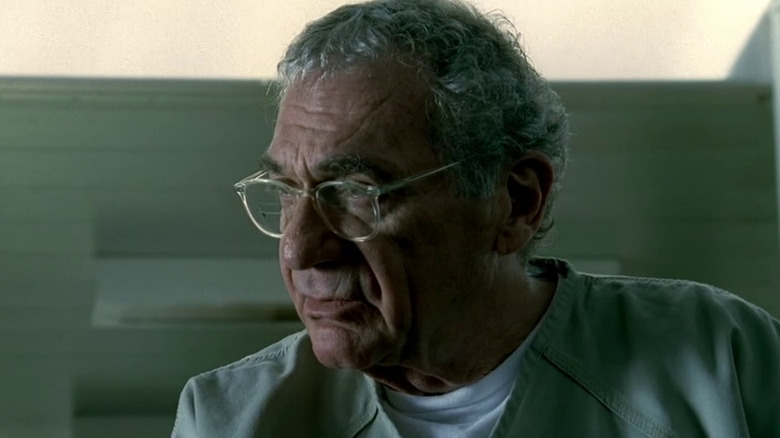 Sydney Pollack as Warren Feldman, looking through glasses in The Sopranos.