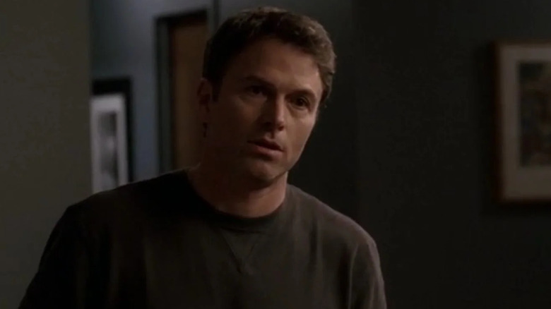 Tim Daly as J.T. Dolan, looking at Christopher in The Sopranos.