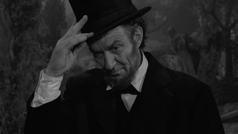 Abraham Lincoln tipping his hat
