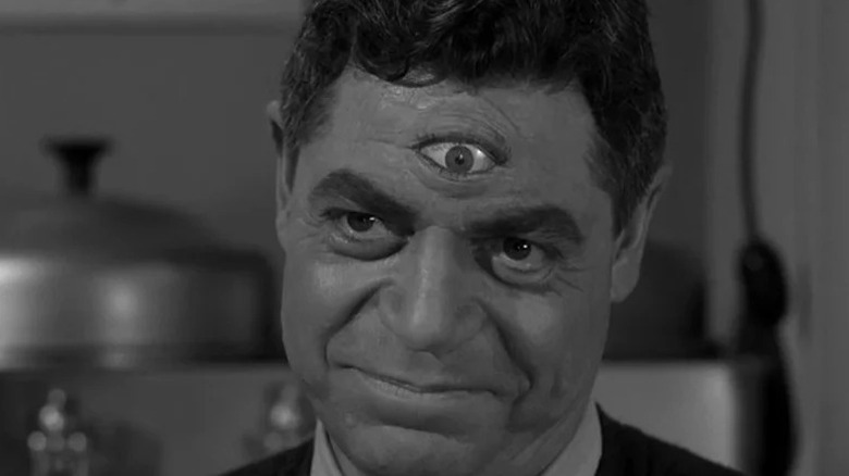 Haley with a third eye on his forehead, smiling