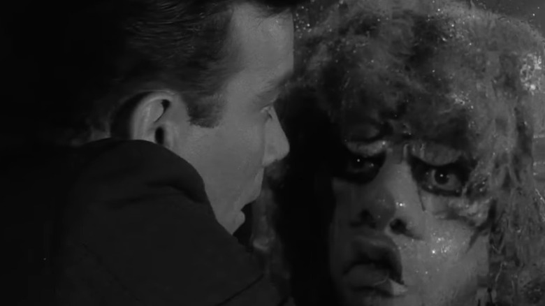 Robert Wilson stares as a monster in The Twilight Zone