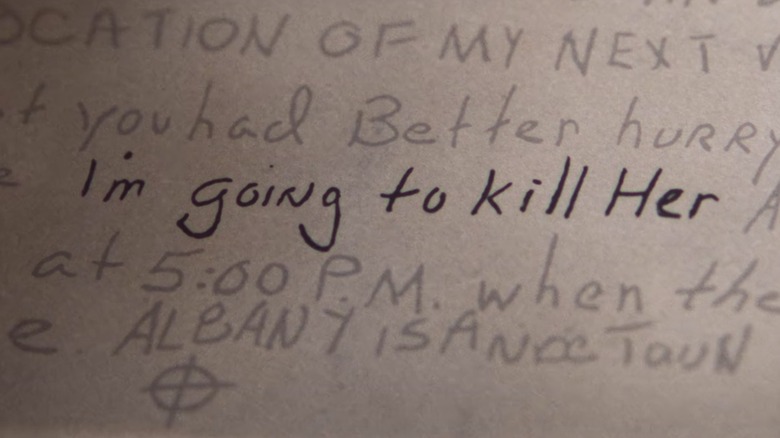 A letter written by the Zodiac, with his symbol visible at the bottom and the darkened text 'I'm going to kill Her'