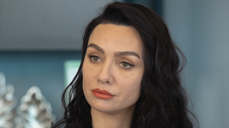 Lale Kiran looking on