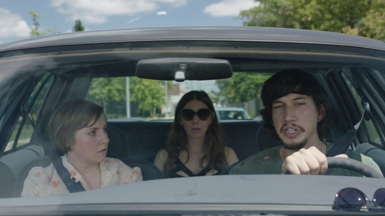 Lena Dunham as Hannah in the car with Adam Driver as Adam and Zosia Mamet as Soshanna in Girls