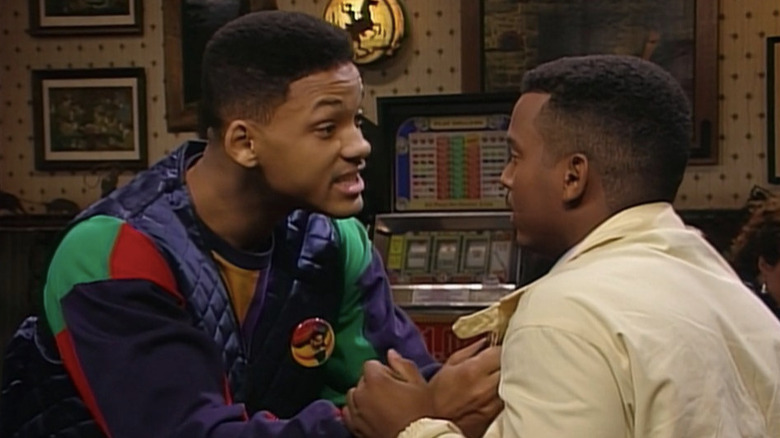Will Smith as Will grabbing at Alfonso Ribeiro as Carlton in a casino in The Fresh Prince of Bel-Air
