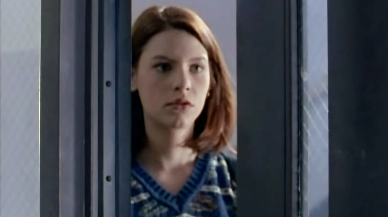 Claire Danes as Angela looks through a door on My So-Called Life