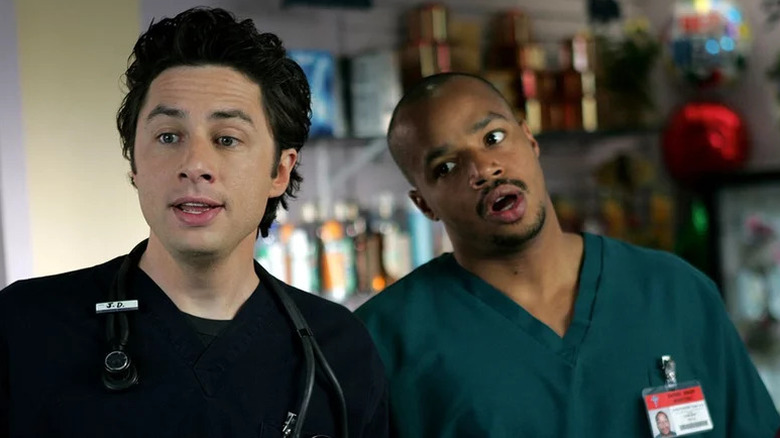 J.D. Dorian (Zach Braff) and Christopher Turk (Donald Faison) react incredulously in Scrubs