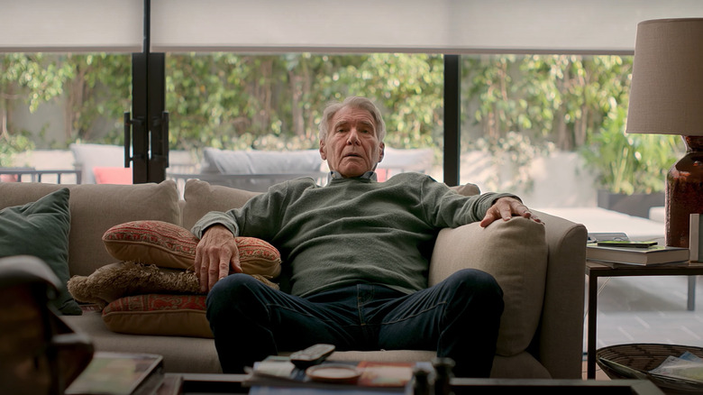 Paul Rhoades (Harrison Ford) reclines on a couch in Shrinking