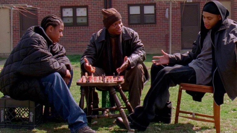 Michael B. Jordan, Lawrence Gilliard Jr., and J.D. Williams, playing chess in The Wire